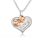 Personalised Two-Coloured Heart Bow Necklace Personalised two-coloured heart necklace with bow detail