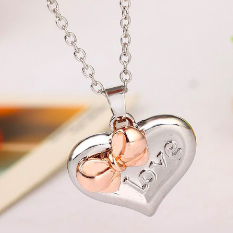 Personalised Two-Coloured Heart Bow Necklace Personalised two-coloured heart necklace with bow detail