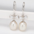 Freshwater Pearl Bow Earrings Freshwater pearl earrings with bows on sterling silver hooks