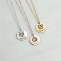 Round pendant necklace personalised with an engraved pet photo