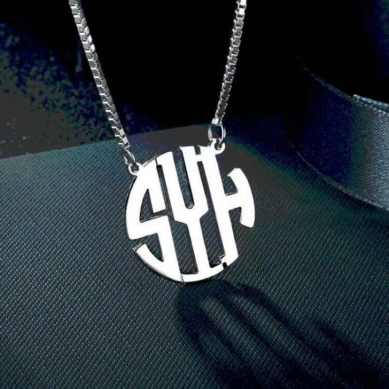 Round monogram initial necklace with a cut-out scripted pendant