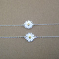 Dainty Sterling Silver Sunflower Bracelet Dainty sunflower bracelet with a yellow gold-coloured centre on a silver chain