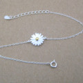 Dainty Sterling Silver Sunflower Bracelet Dainty sunflower bracelet with a yellow gold-coloured centre on a silver chain