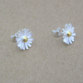 Dainty Sterling Silver Sunflower Earrings Dainty sunflower earrings with silver petals and yellow gold-plated centres