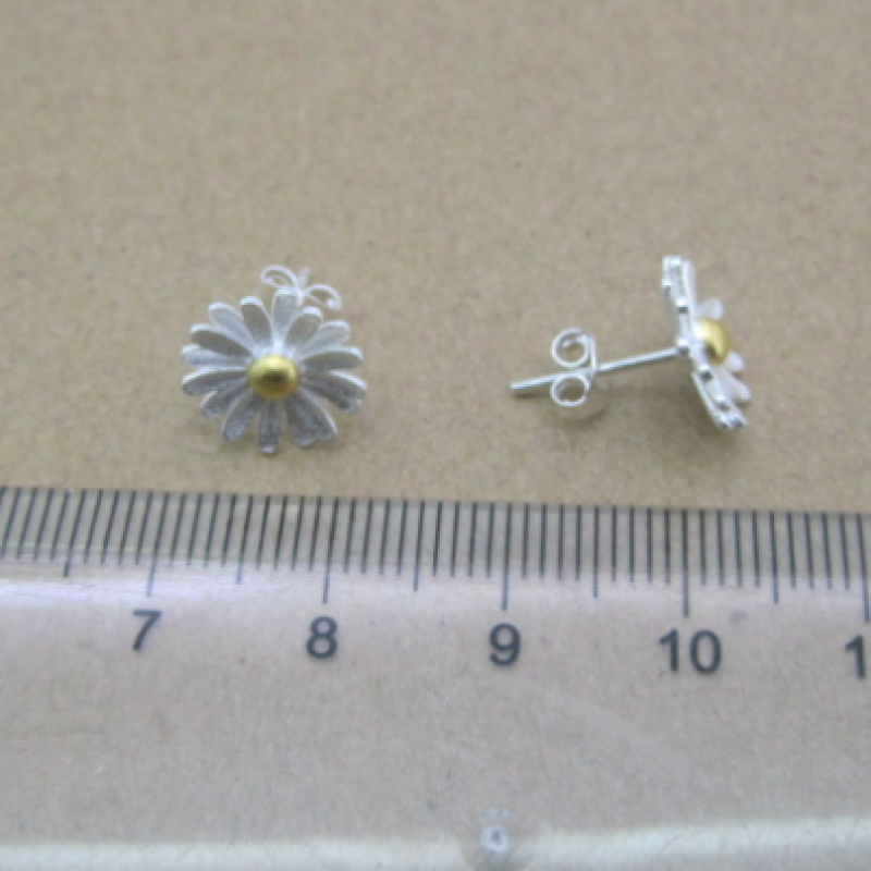 Dainty Sterling Silver Sunflower Earrings Dainty sunflower earrings with silver petals and yellow gold-plated centres