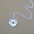 Dainty sunflower necklace with a matte-pattern pendant and yellow-gold-plated centre