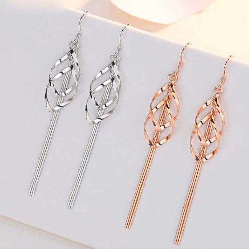Long tassel drop earrings with geometric pendants