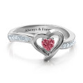 Accented heart ring with a heart-shaped centre stone and round accent stones