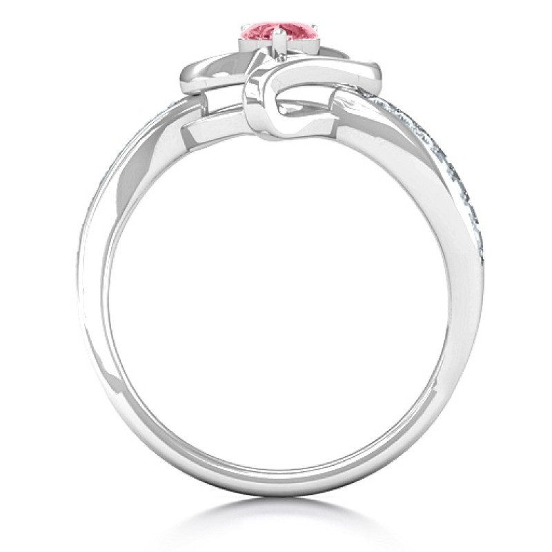 Side view of the curved band on the accented heart ring