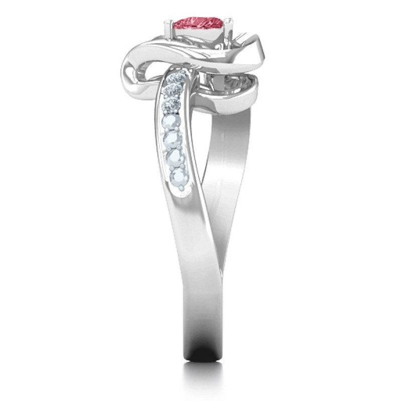 Accented heart ring with heart-shaped centre stone