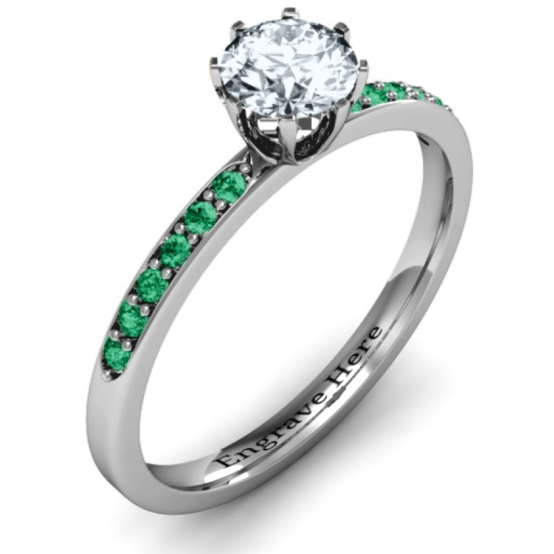 8-prong solitaire ring with twin channel accent stone rows