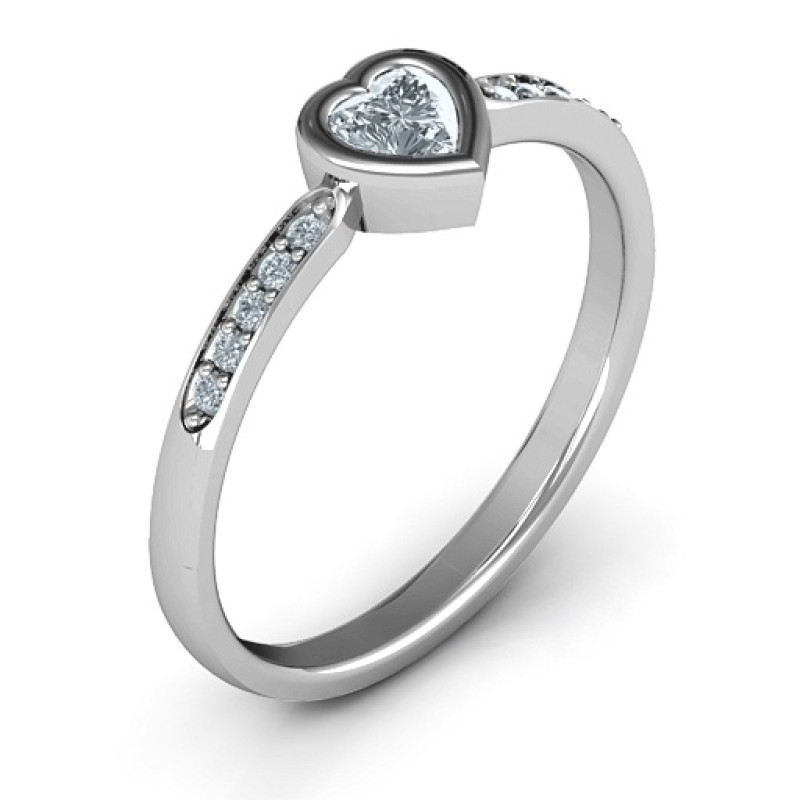 Bezel set love ring with a heart-cut centre stone and accent stones