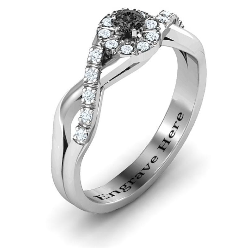 Braided floral cluster ring with round centre stone and shoulder accents
