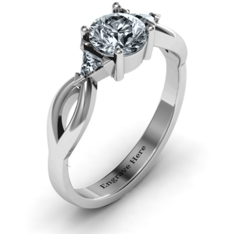 Braided Shank Ring with Trillian Accents Braided shank ring with a round centre stone and triangle accents