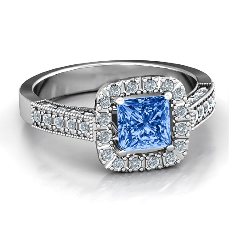 Princess-cut ring with round profile accent stones