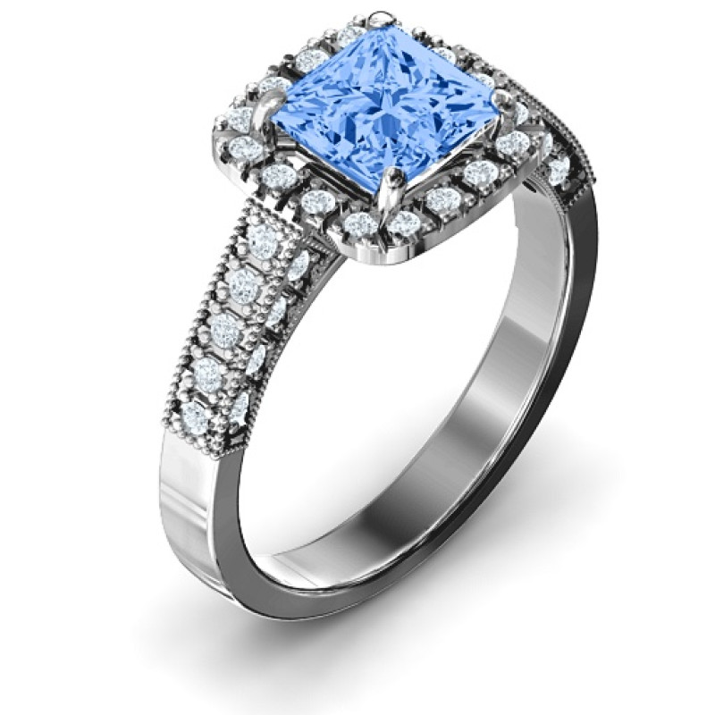 Side view of princess-cut ring with accent stones