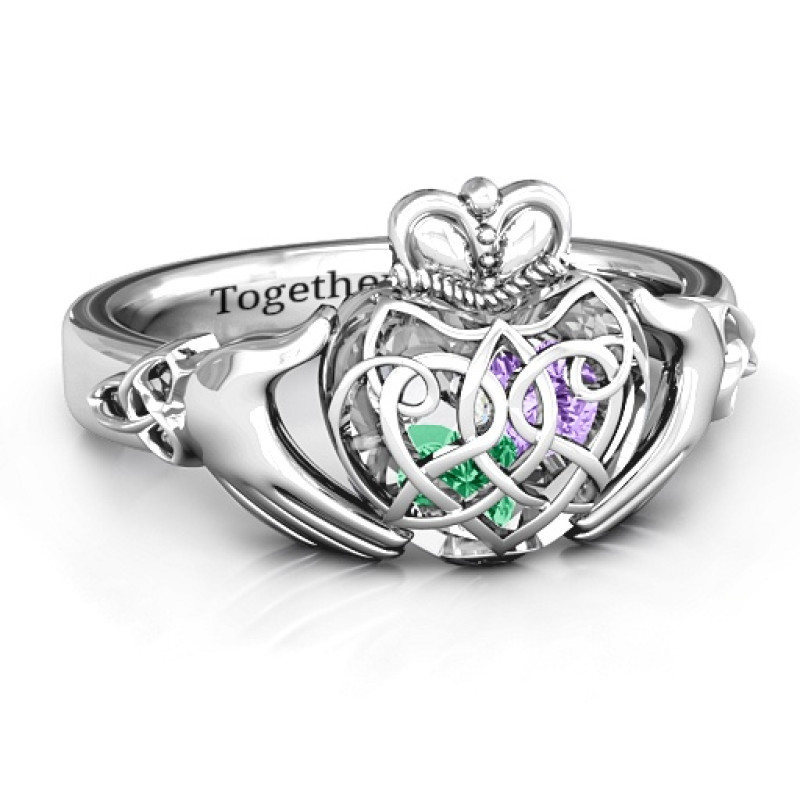 Caged Hearts Celtic Claddagh Ring Caged Hearts Celtic Claddagh Ring with a heart cage and heart-shaped stone details