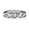 Classic Solitaire Ring with Infinity Band Classic solitaire ring with infinity band and round centre stone