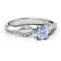 Dimpled Solitaire with Accents Ring Dimpled solitaire ring with round centre stone and accent stones