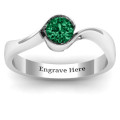 Fancy Solitaire Swirl Ring Fancy Solitaire Swirl Ring with a centred solitaire and swirl-designed band
