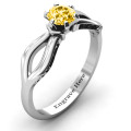 Fancy split shank solitaire ring with round centre stone