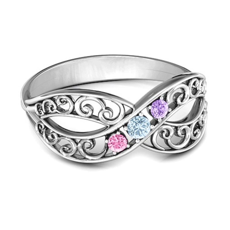 Forever Filigree Infinity Ring with a filigree infinity symbol and round centre stones