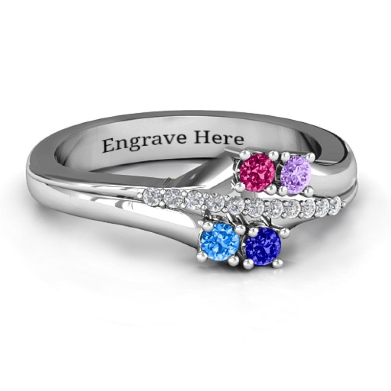 Four Stone Ring with Accents Four Stone Ring with Accents featuring four round stones and eleven accent stones