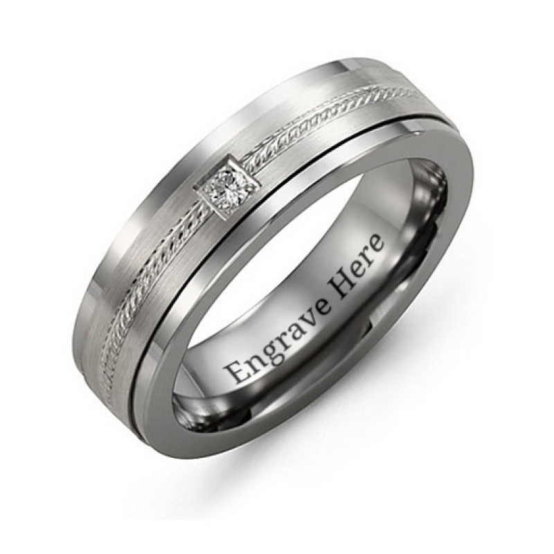 Gemstone ring with diamond-cut grooves and a round centre stone