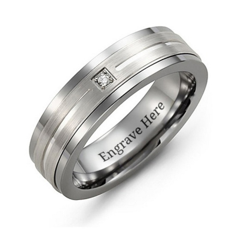 Gemstone ring with a grooved brushed centre and round stone