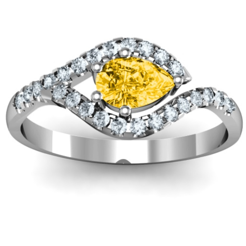 Golden Eye Pear Custom Ring with Accent Stones Golden Eye Pear custom ring with centre and accent stones