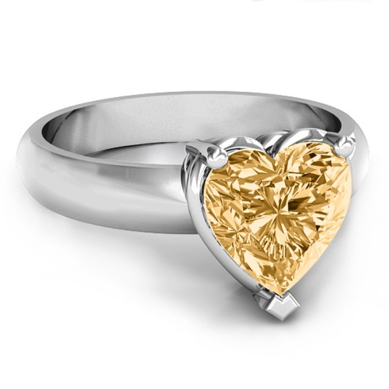 Heart stone in a double gallery setting ring