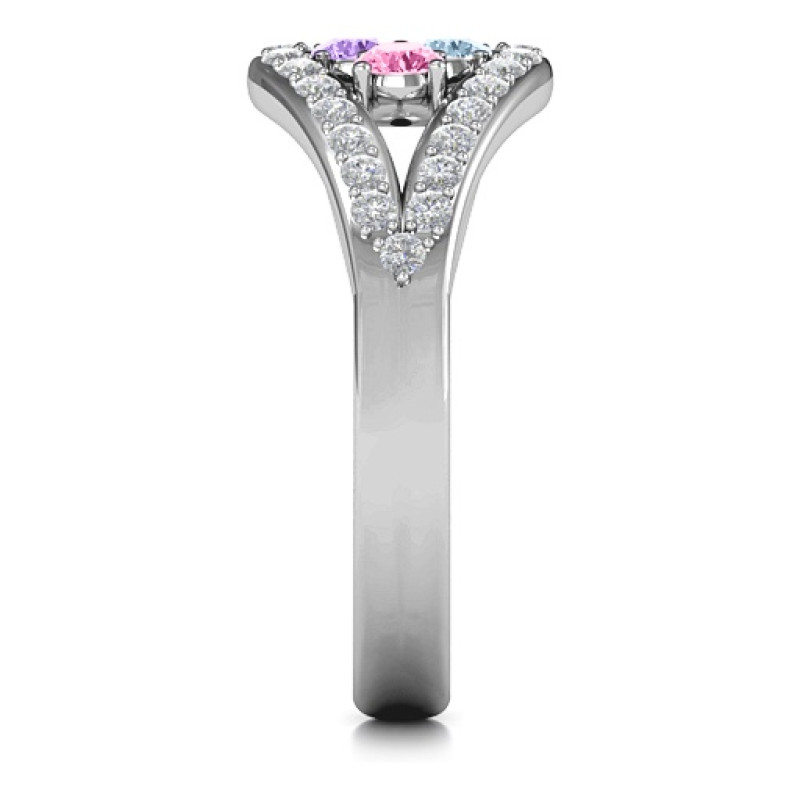 Illuminating Accents Ring Illuminating Accents Ring with three round centre stones and a looped accent band