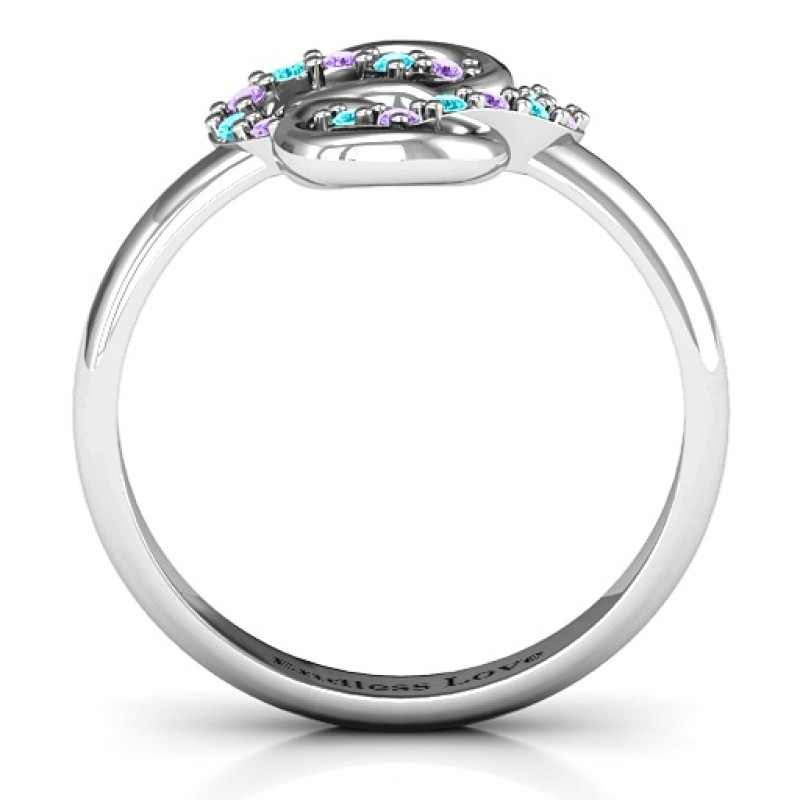 Infinite Love Heart and Infinity Stone Ring Infinite Love ring with a heart and woven infinity knot design with stones