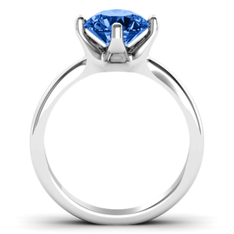 Large stone solitaire ring with round centre stone