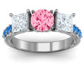 Three Stone Eternity Ring with Twin Accents Three stone eternity ring with round centre stone, princess-cut side stones and twin accent rows