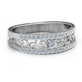 Mesmeric Love Ring with central round stone and filigree-detailed band