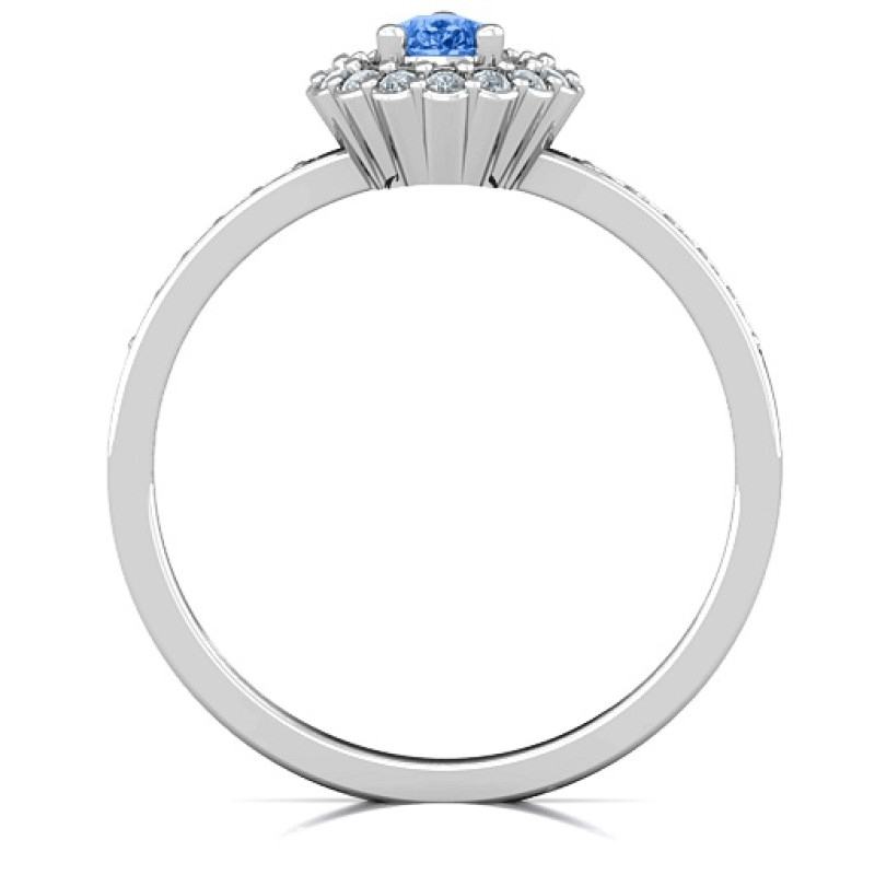 Pear shaped halo ring with a centre stone and prong-set shoulder accents