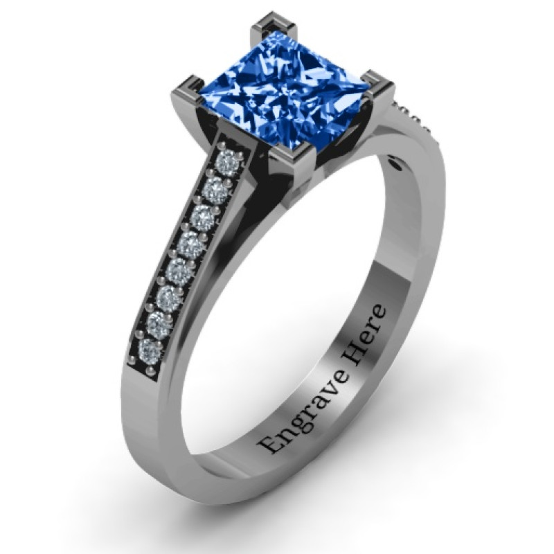 Princess Cut Ring with Channel Set Accents Princess-cut zirconia ring with channel-set accent stones