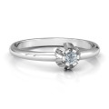Solitaire gemstone ring with a scalloped setting