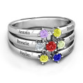 Spidra Round Centre Ring with a round centre stone and six side stones