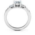 Andrea engagement ring with round centre stone and baguette side stones