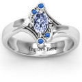 Fancy oval asymmetrical ring with oval centre stone and accent stones