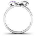 Fancy stone set bow ring side view