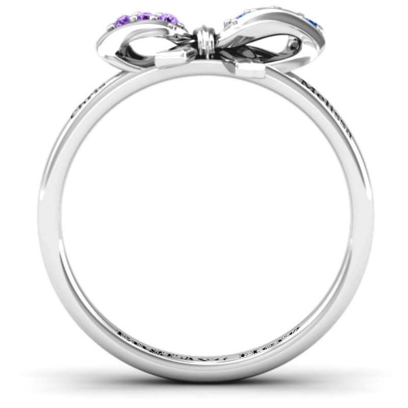 Fancy stone set bow ring side view