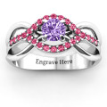 Fancy woven solitaire ring with an open crisscross band and accent stones