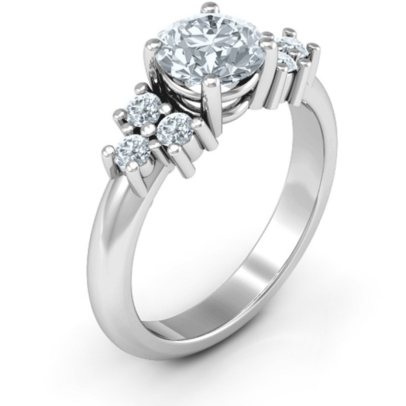 Flourish Engagement Ring Flourish engagement ring with a round centre stone and side stone clusters