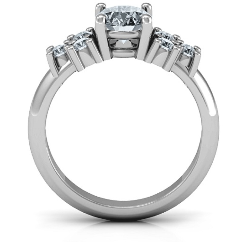 Flourish Engagement Ring Flourish engagement ring with a round centre stone and side stone clusters