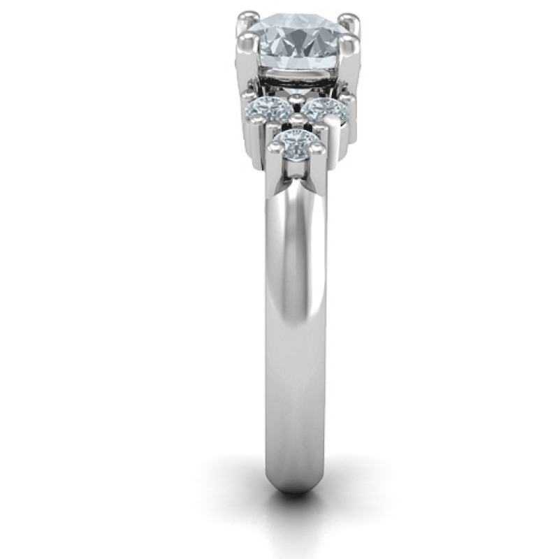 Flourish Engagement Ring Flourish engagement ring with a round centre stone and side stone clusters
