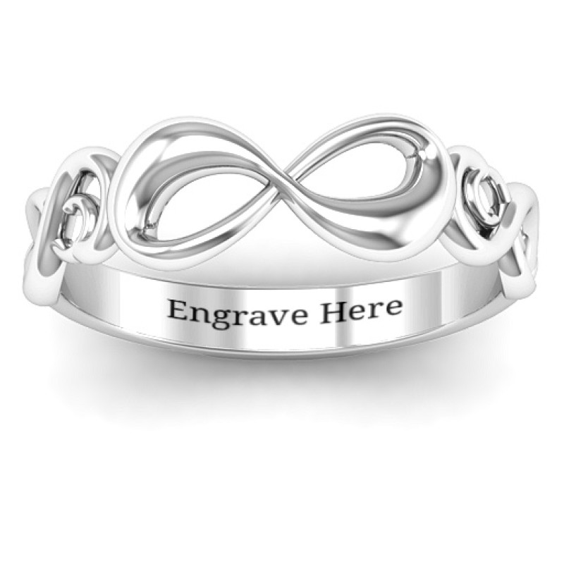 Sterling Silver Groovy Infinity Ring Groovy infinity ring with a central infinity symbol and two smaller side symbols