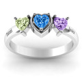 Heart stone ring with a central heart stone and two heart accents